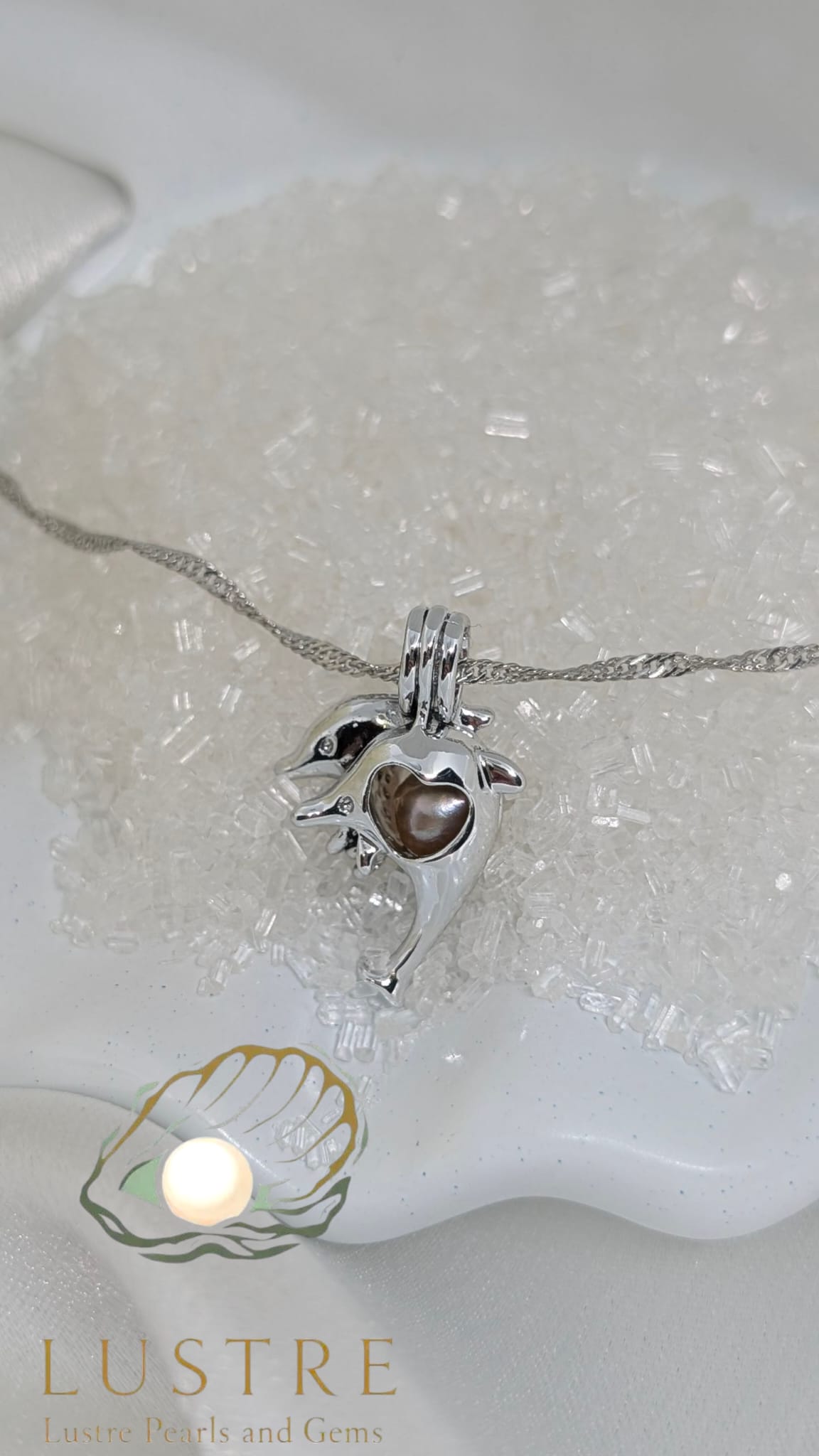 Dolphin cage pendant
