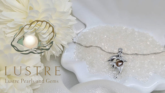 Dolphin cage pendant