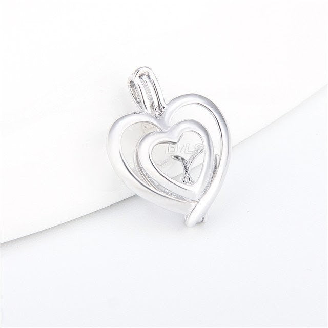 Double heart pearl cage
