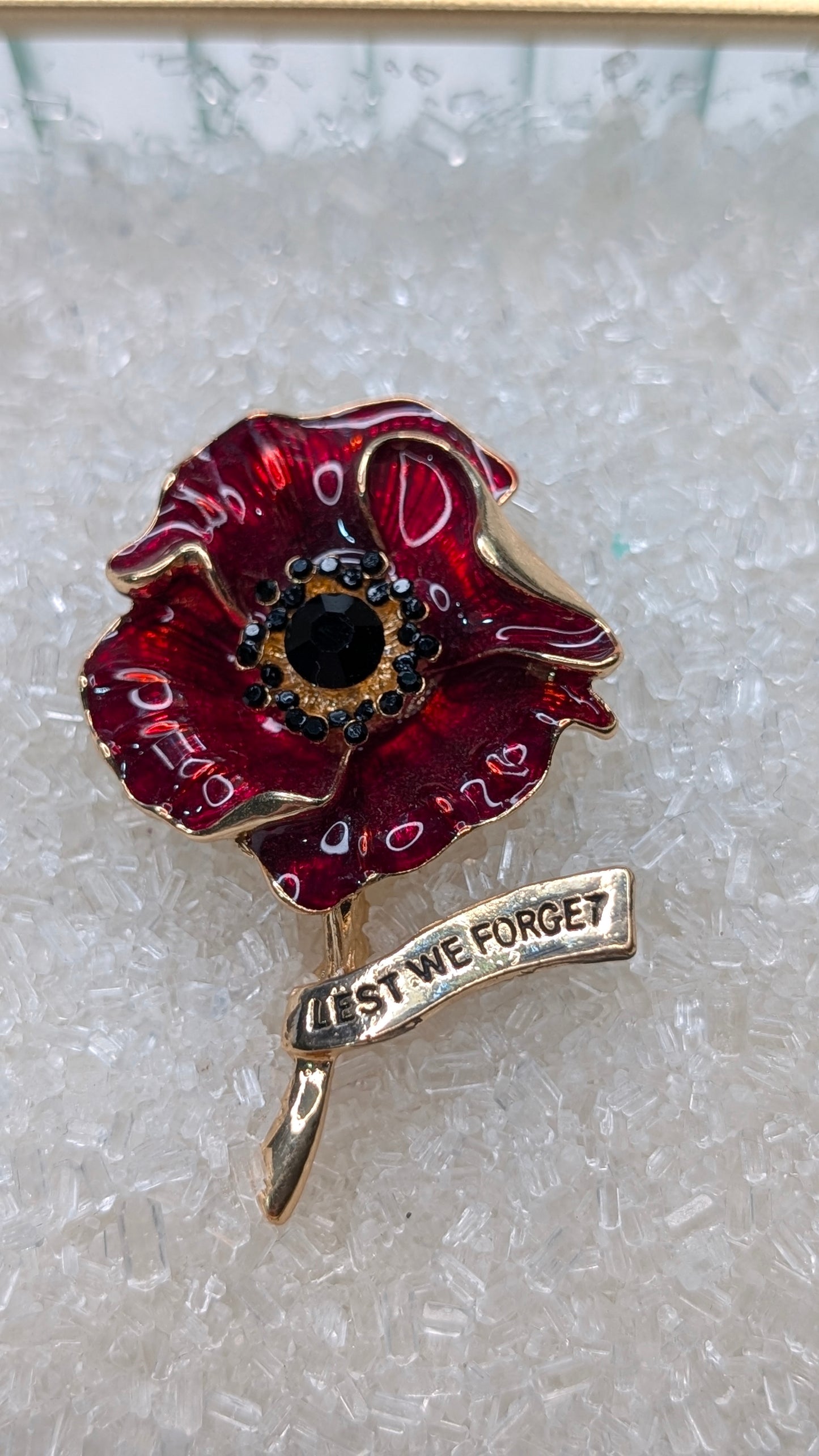 Red poppy on gold