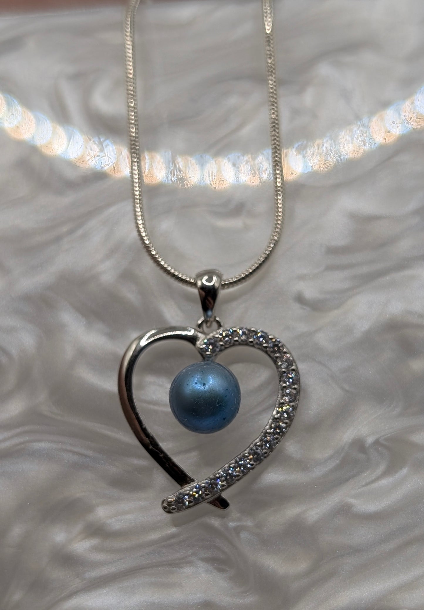 Blue pearl heart pendant