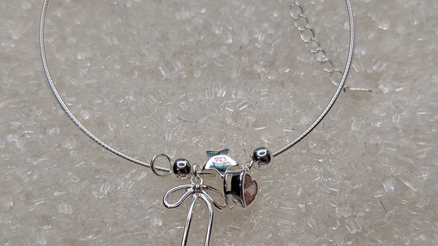 Pink heart, bow and pearl charm bangle