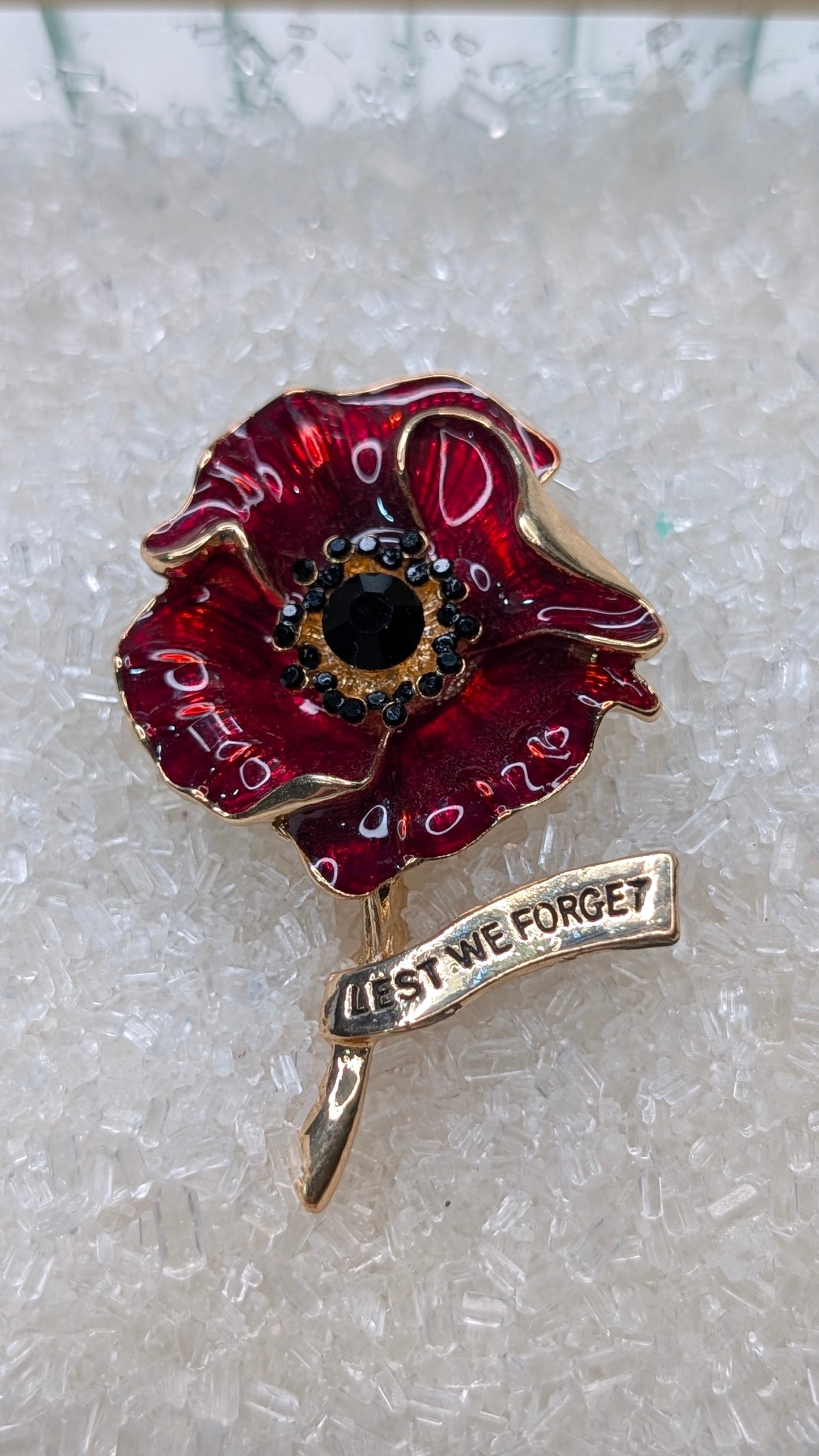 Red poppy on gold