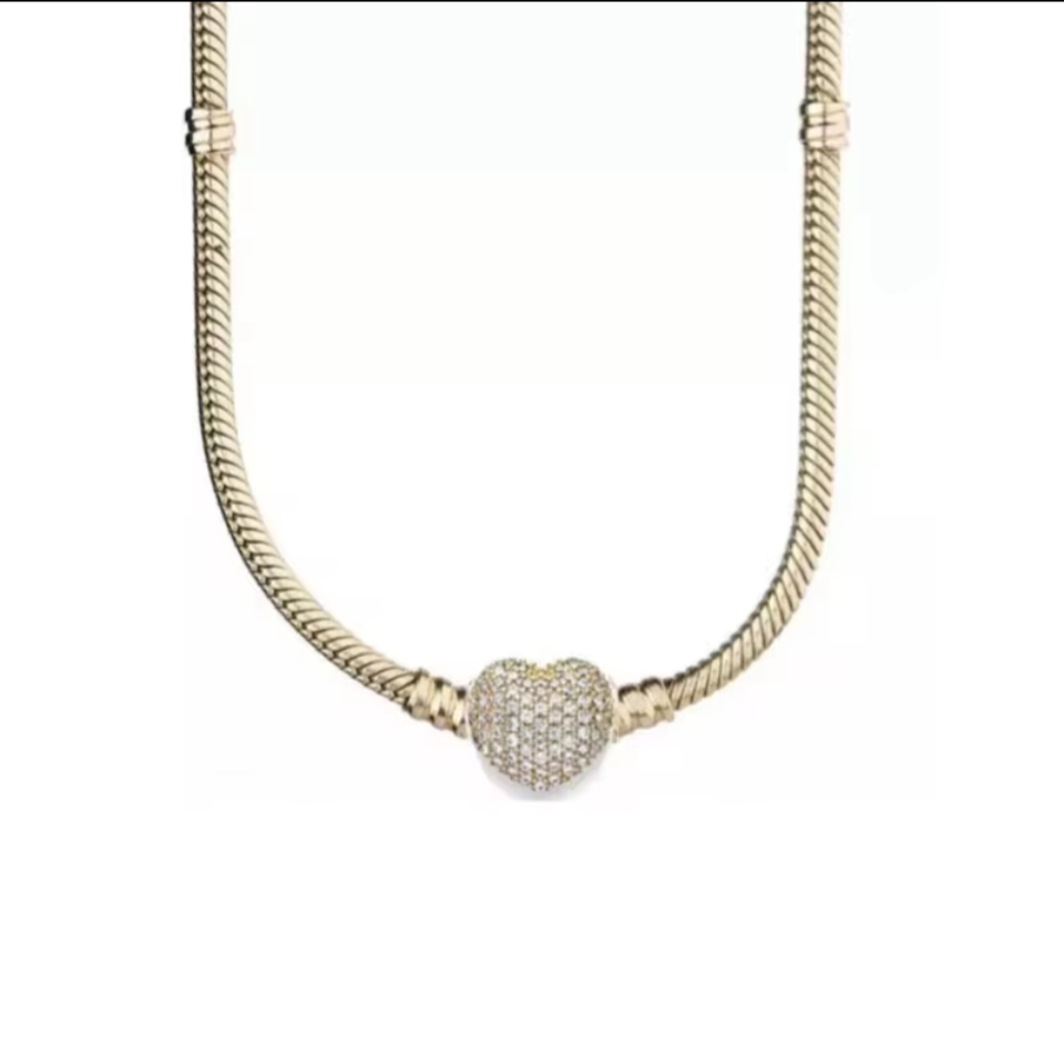 Gold jewelled heart charm necklace