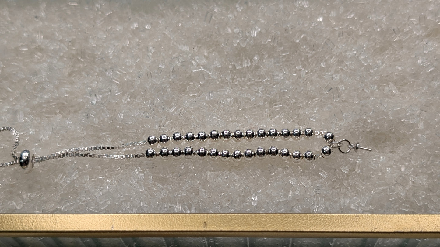 sterling silver beaded bracelet with centre pearl