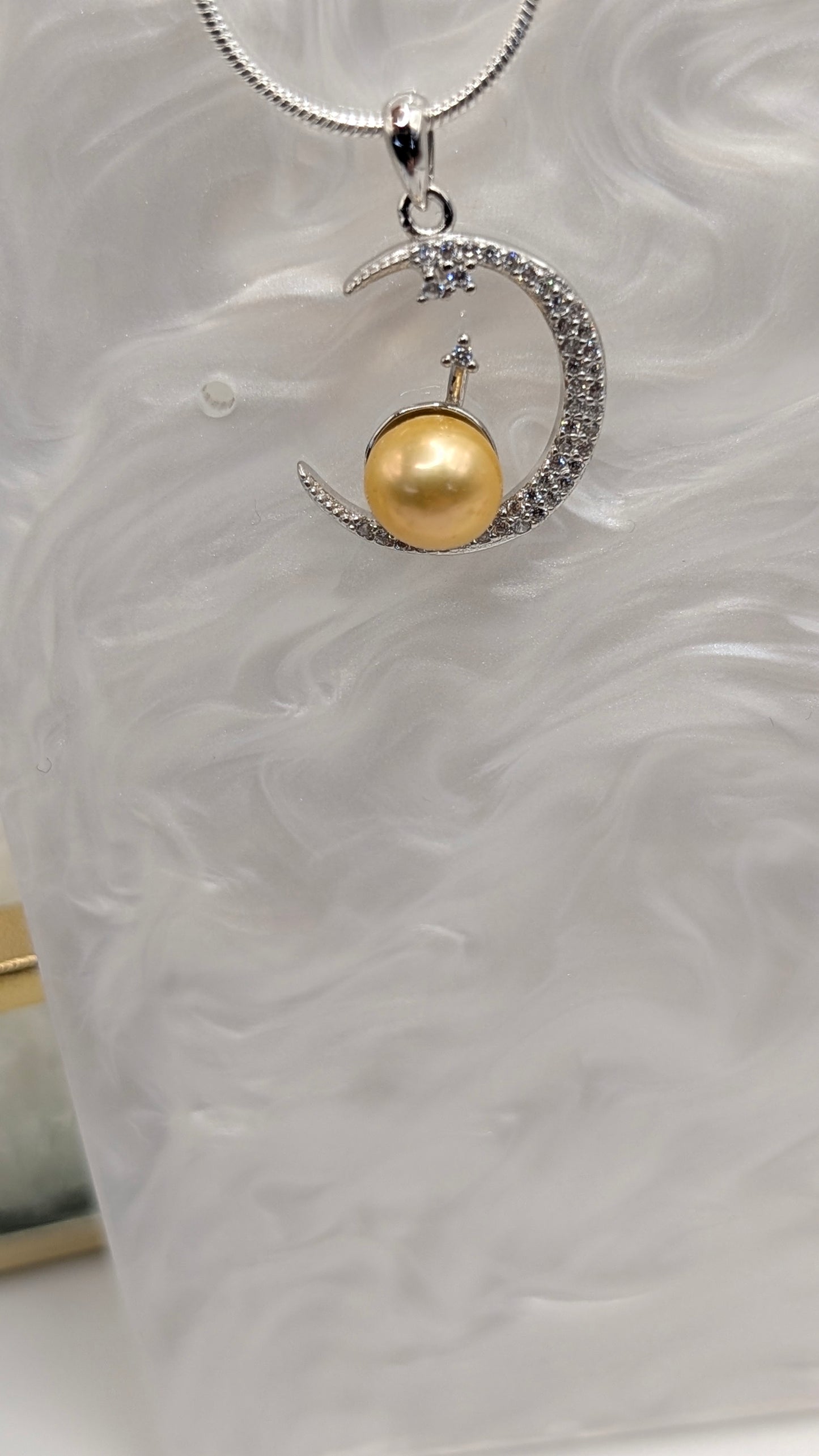 Sun moon and star pearl pendant