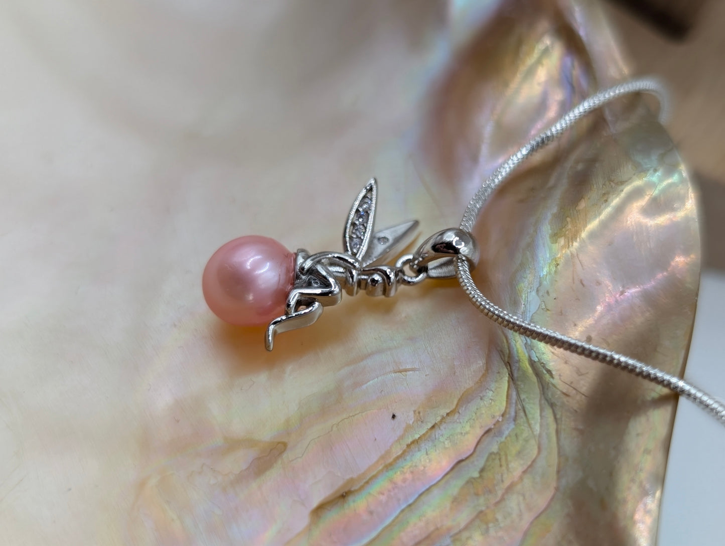 Garden fairly pendant with baby pink pearl
