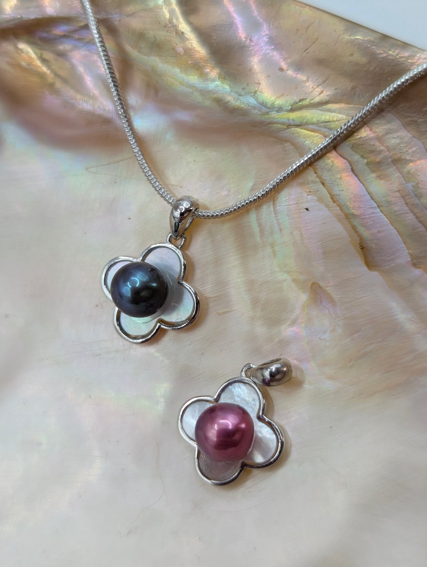 Mother of pearl inlay cover with dark deep ocean blue pearl