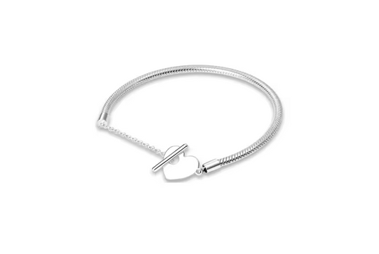 Feed through heart charm bracelet