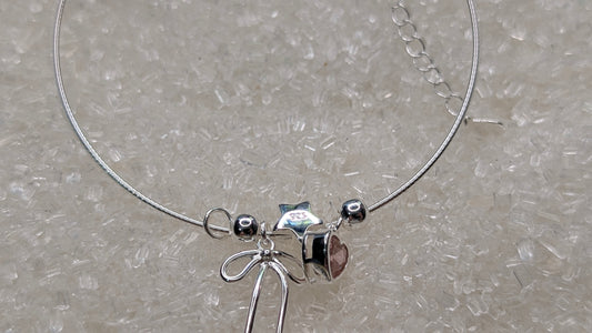 Pink heart, bow and pearl charm bangle