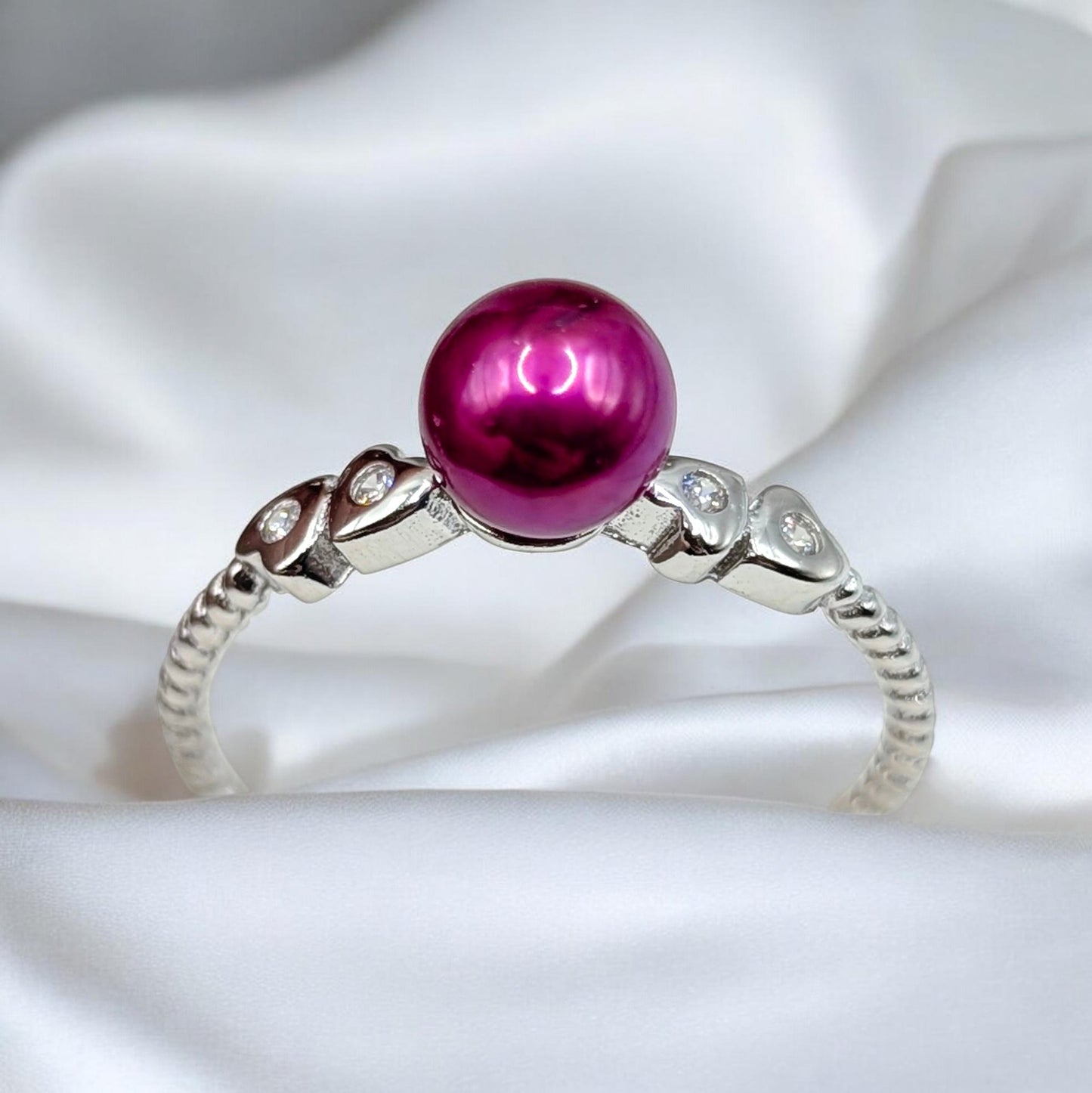 Heart twist berry pink ring size Q