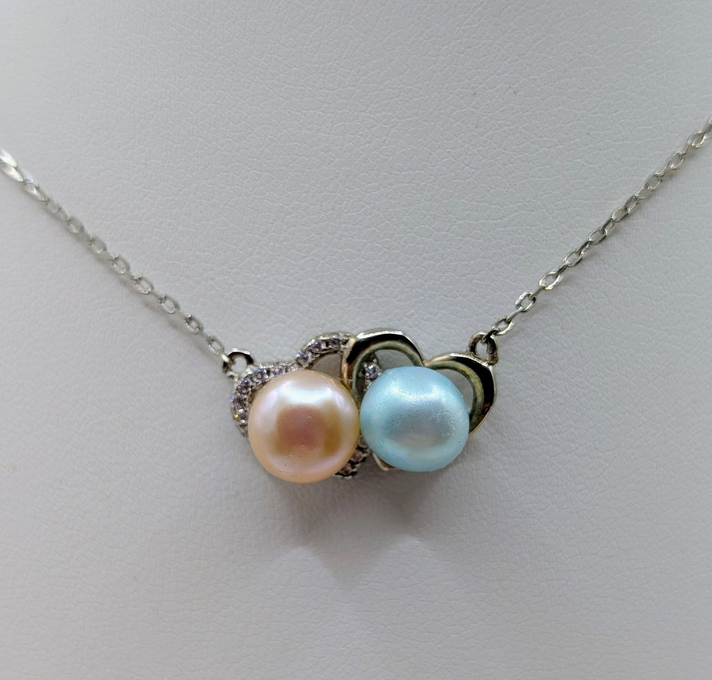 Double heart, double pearl necklace peach and blue pearls