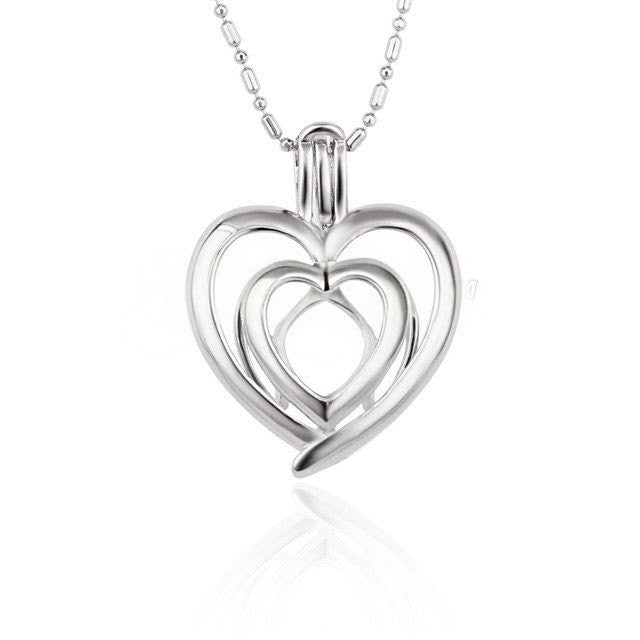 Double heart pearl cage