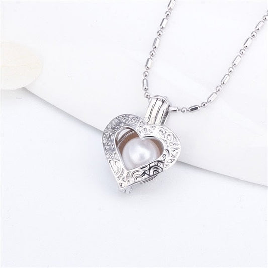 vintage heart pearl cage