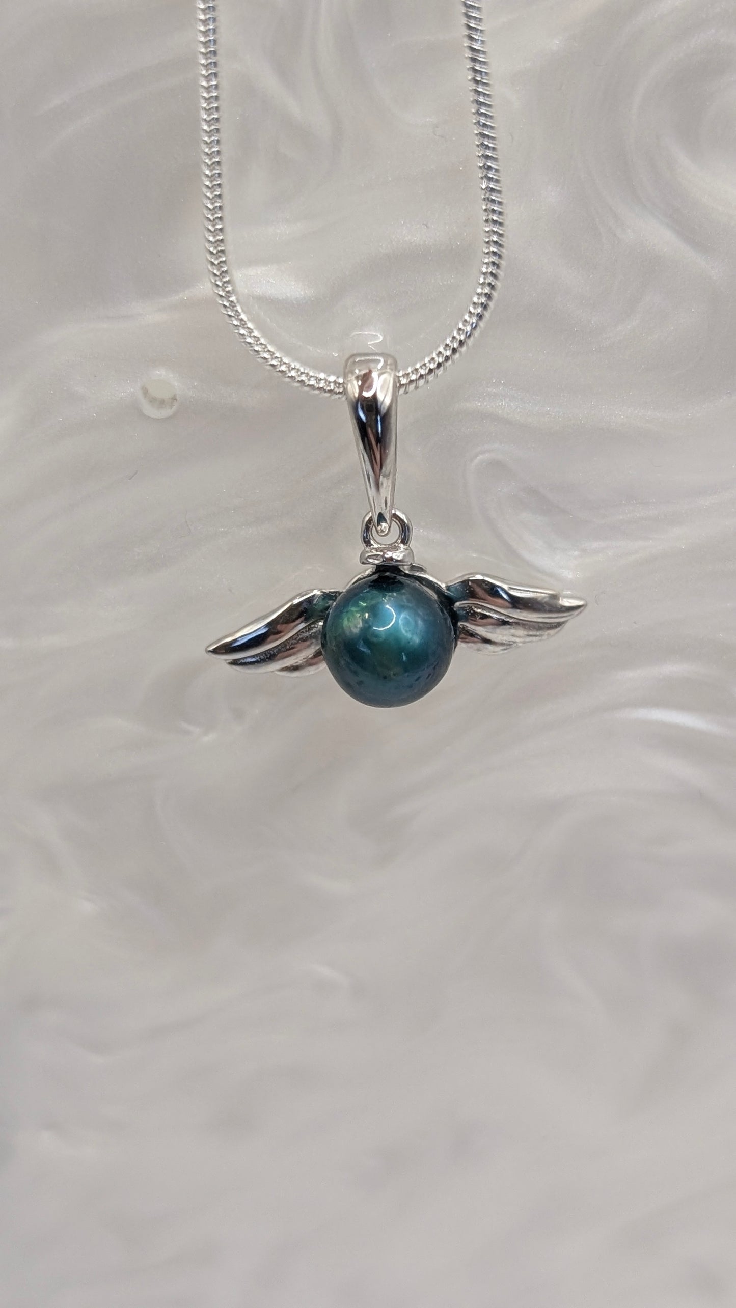 Pearl wings pendant