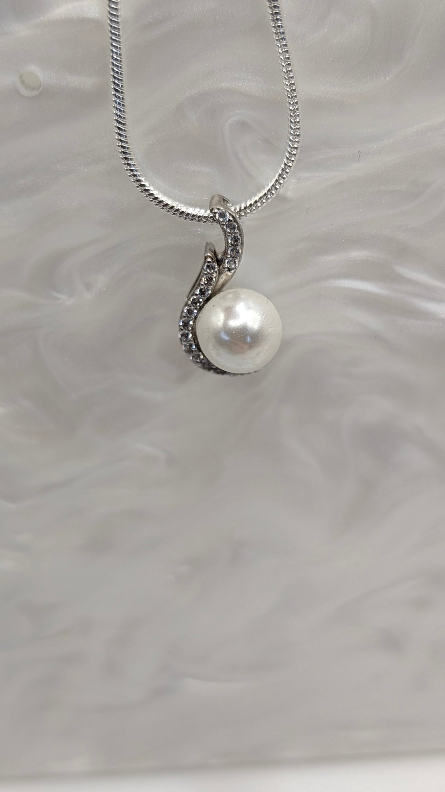 White pearl pendant