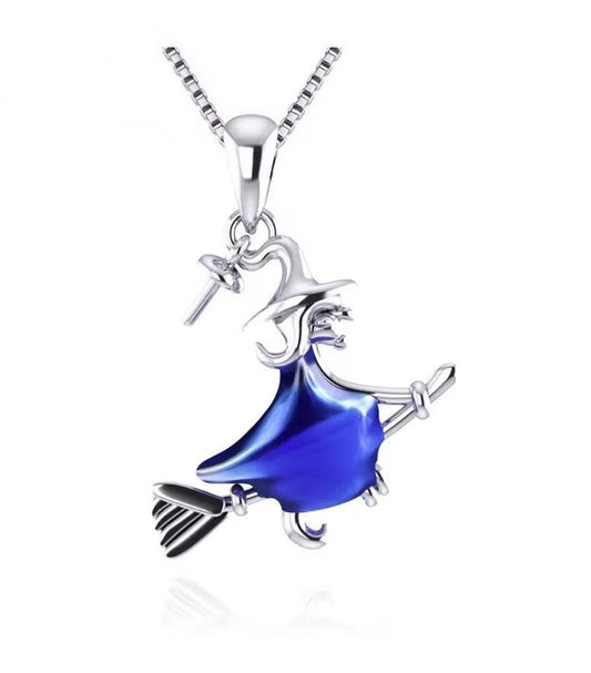 Witch on a broom pearl pendant