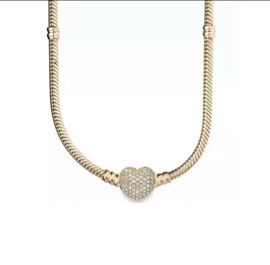 Gold jewelled heart charm necklace