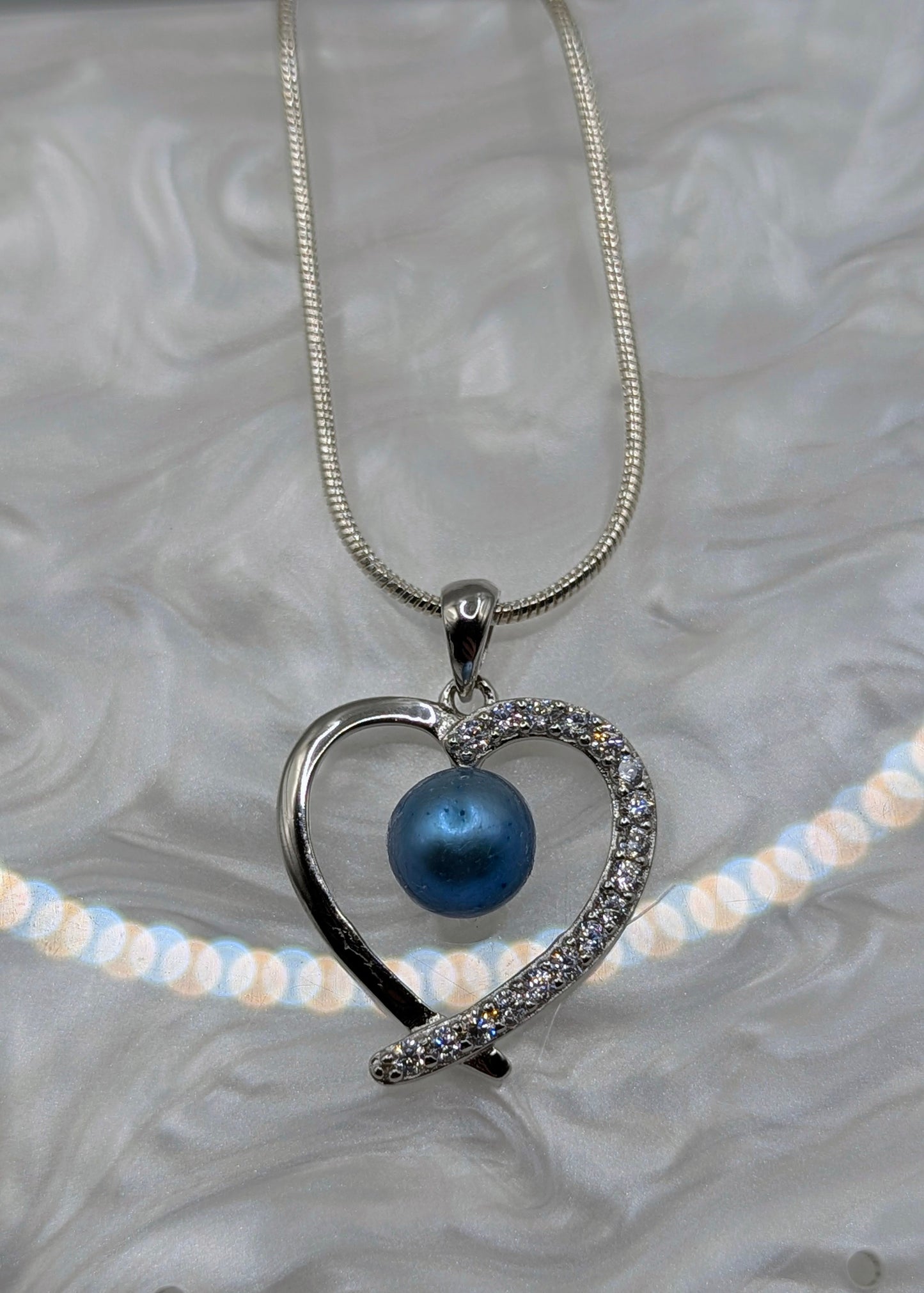 Blue pearl heart pendant