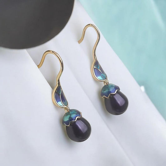 Gold dangles with peacock colour decor with dark blurple pearl drops