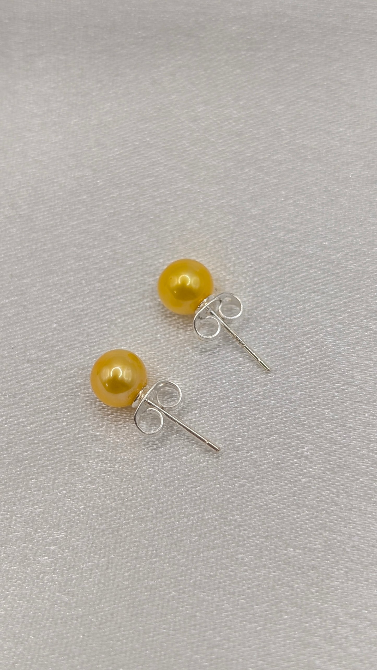Yellow pearl stud earrings