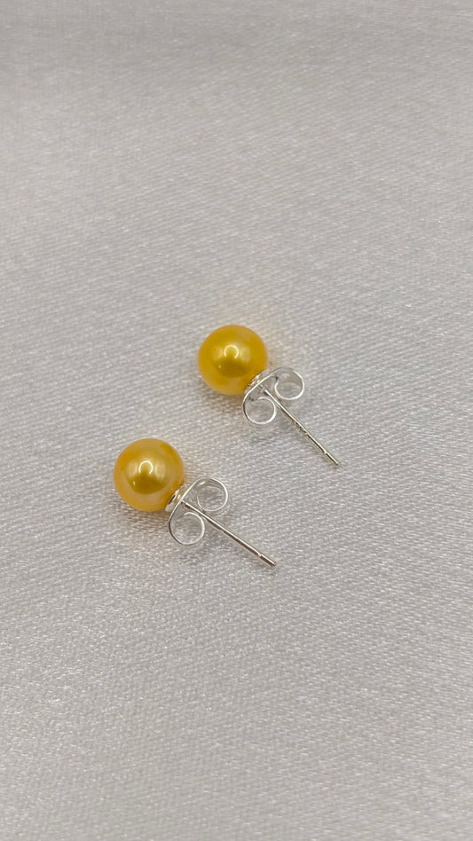 Yellow pearl stud earrings