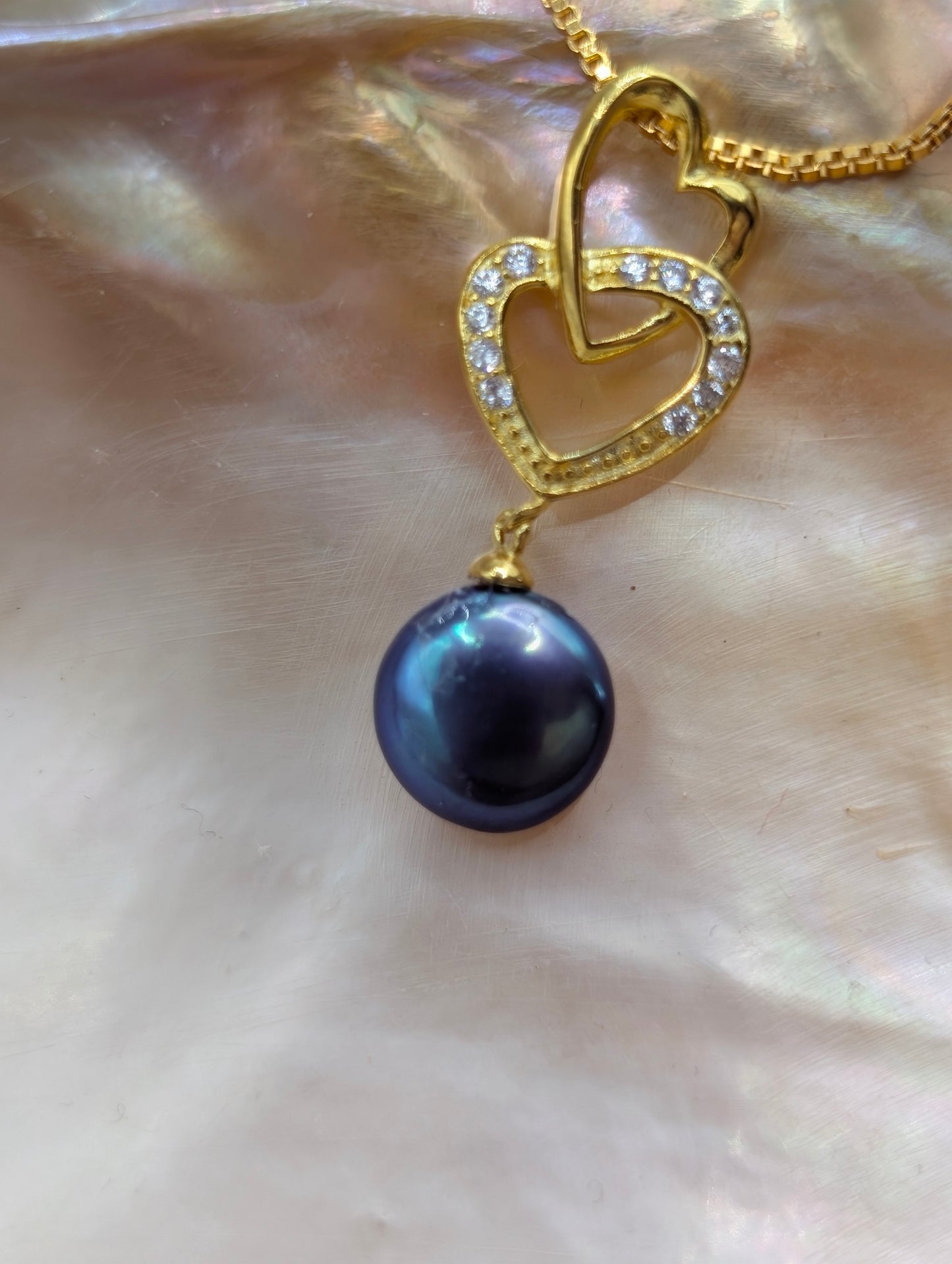 Gold double heart drop with peacock pearl coin