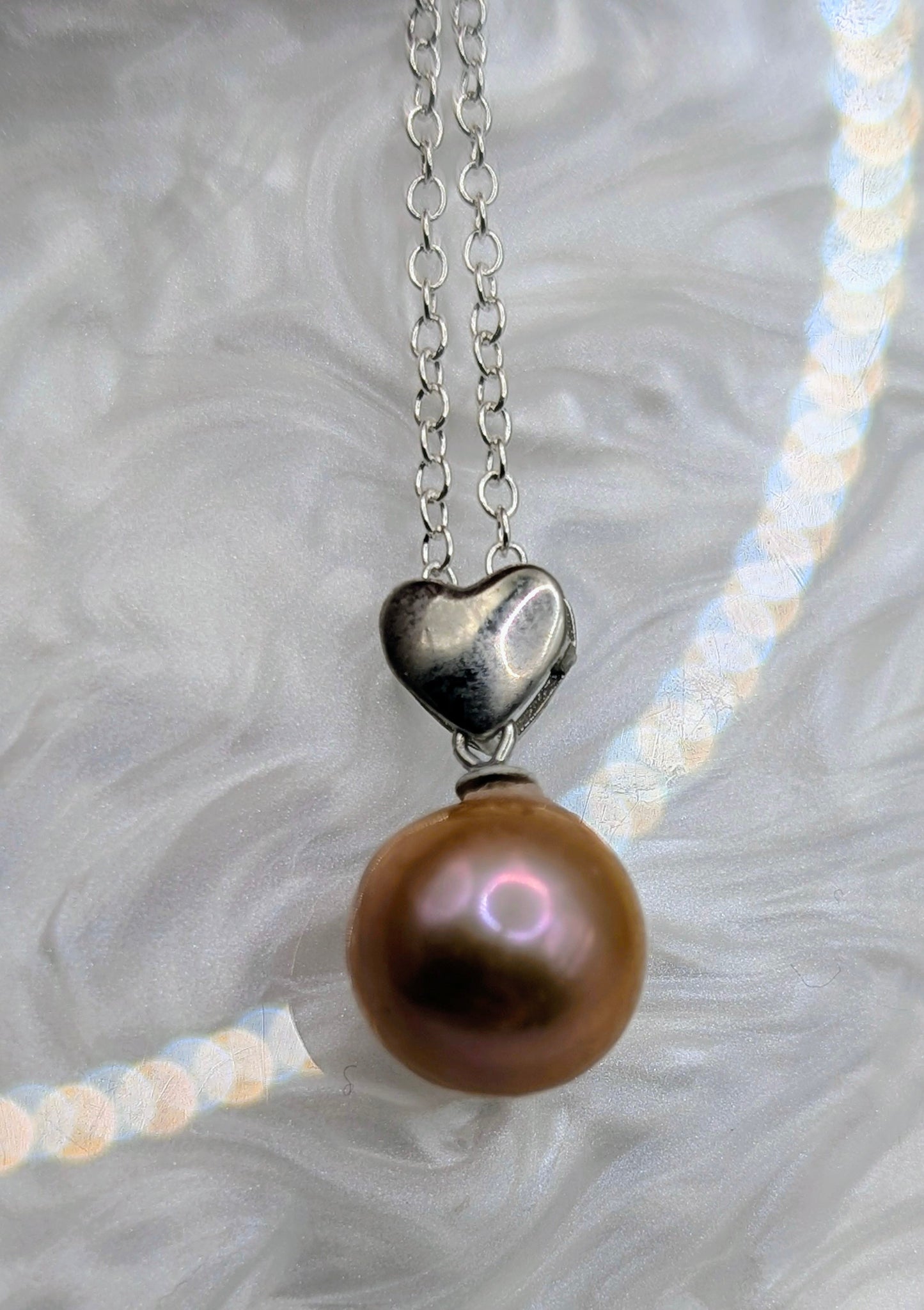 Blush pink Edison on heart drop pendant