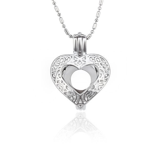 vintage heart pearl cage