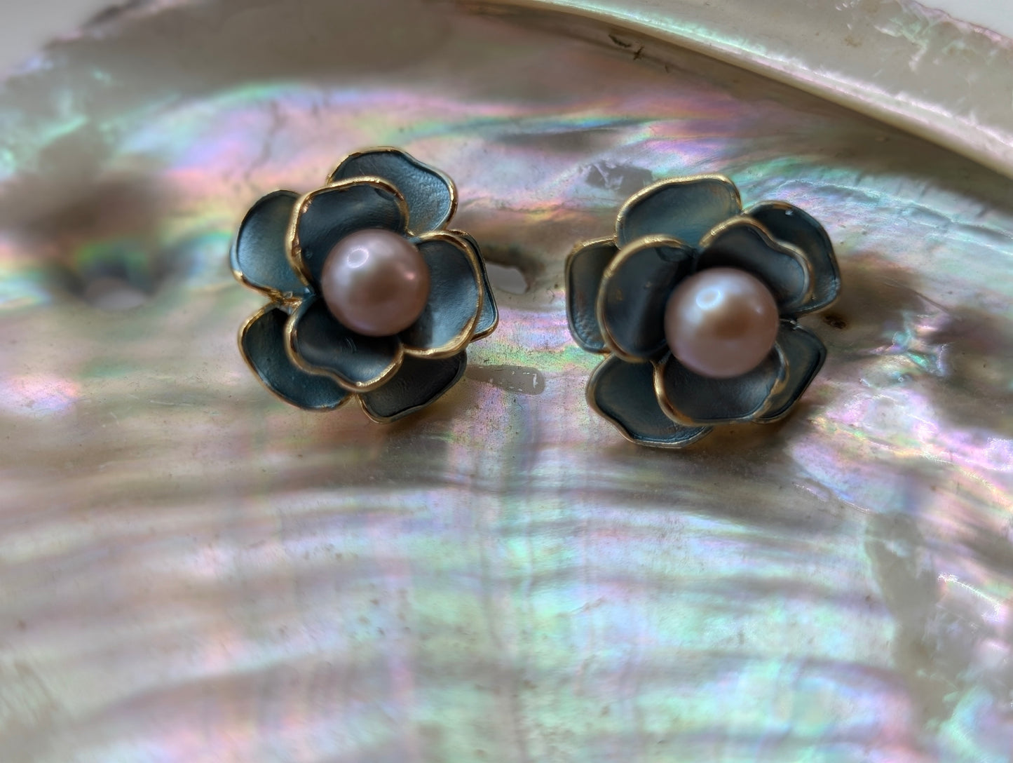 Gold flower earrings with green enamel petals and freshwater pearls