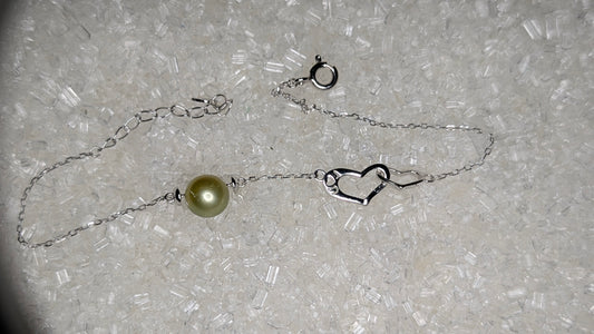 Suspended pearl heart bracelet