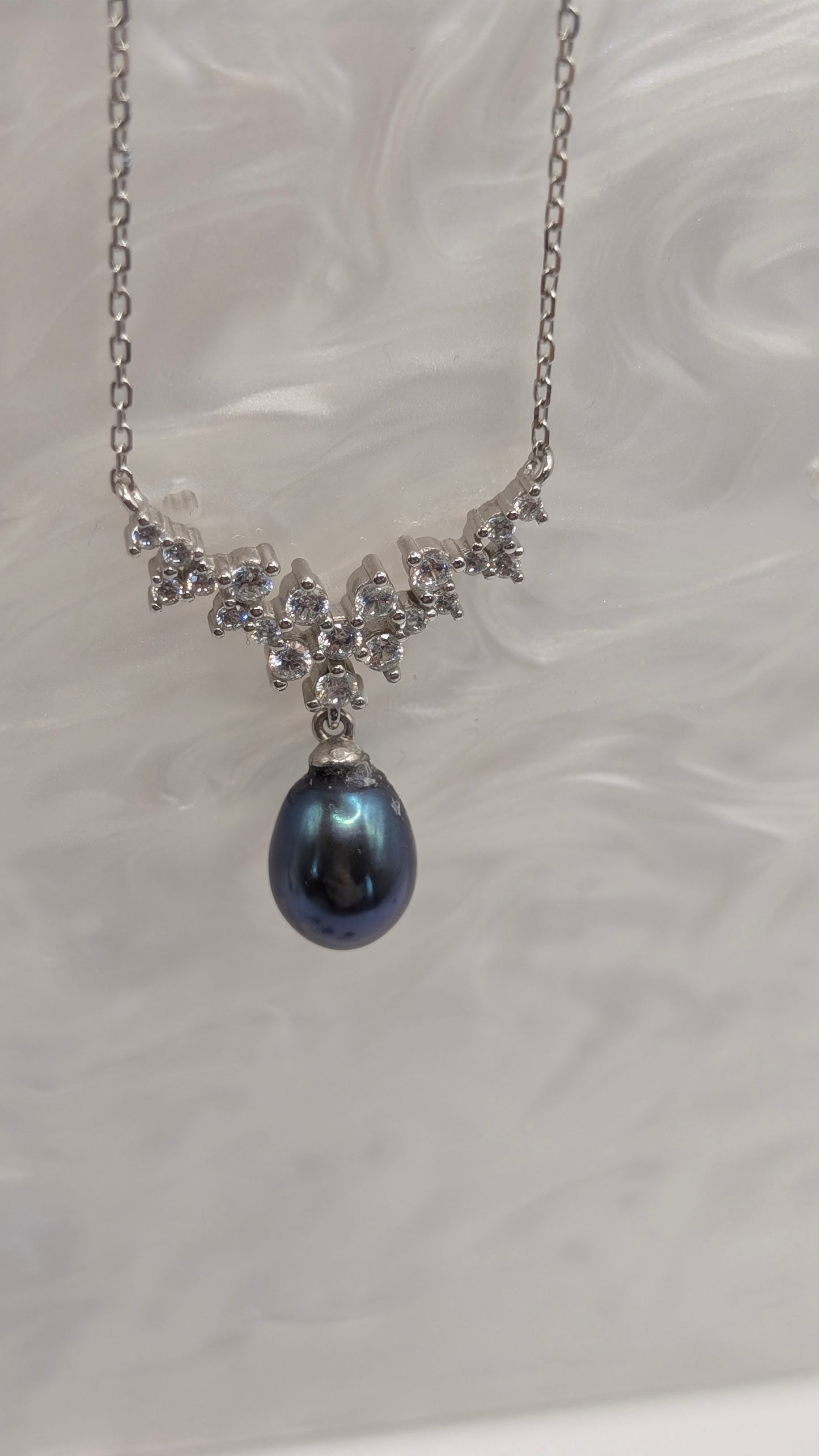 3 tier Showstopper with peacock pearl