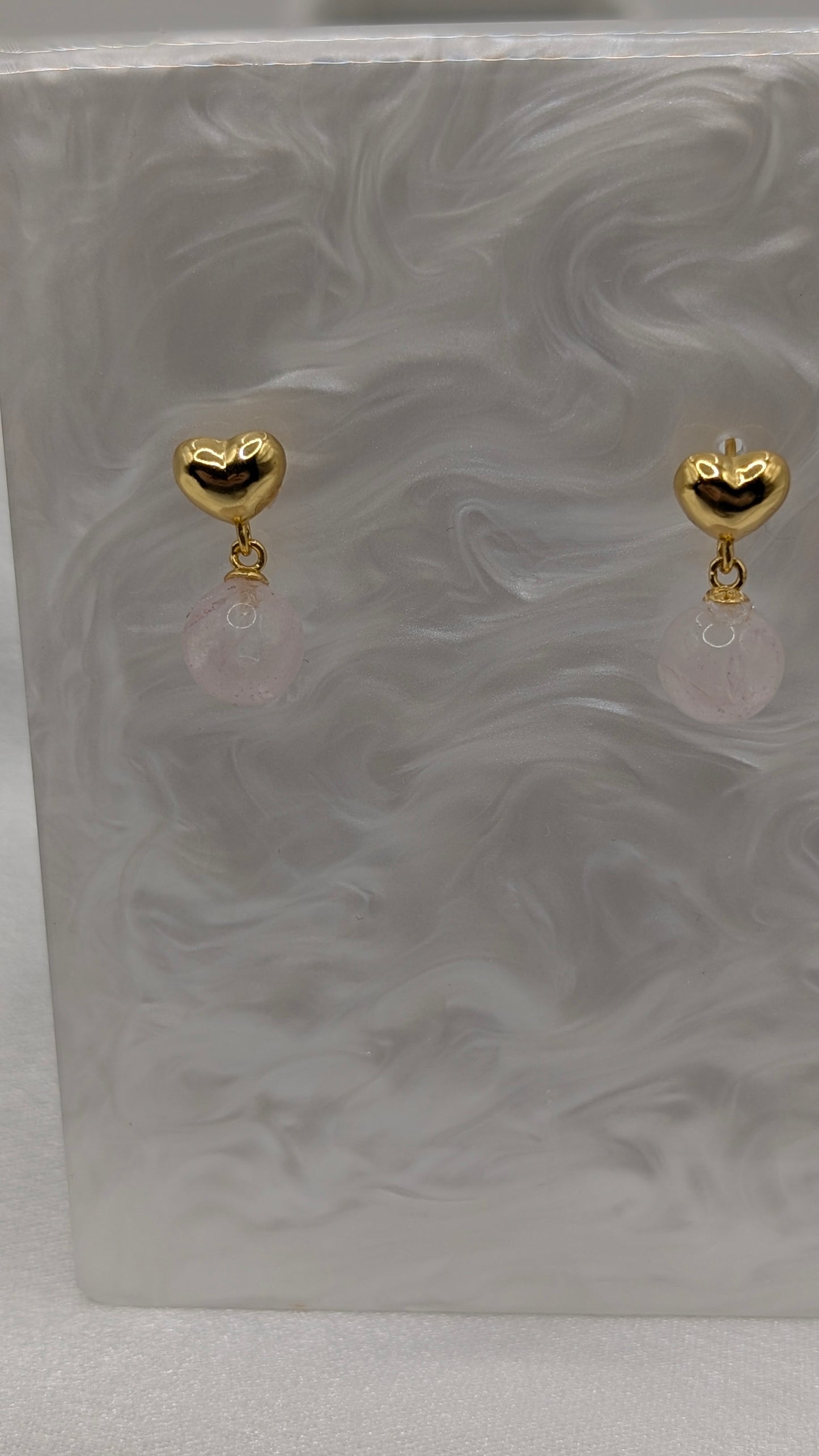 Gold heart dangle earrings with pink quartz gem balls
