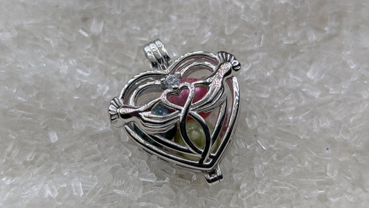 Hand holding heart large cage