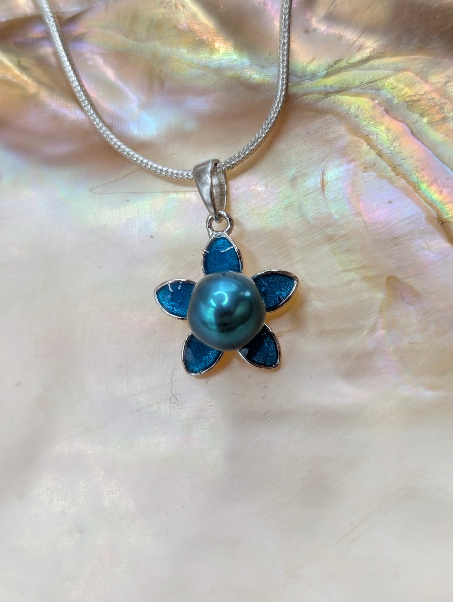 Blue/teal pearl flower pendant