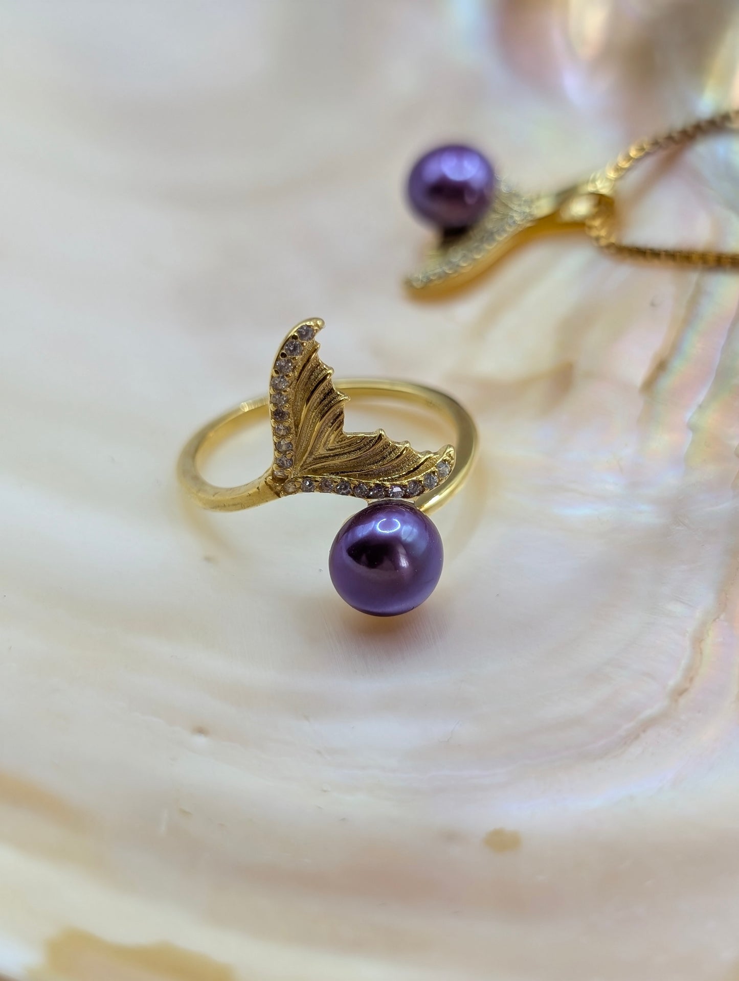 Gold mermaid tail ring and pendant set with matching purple pearls