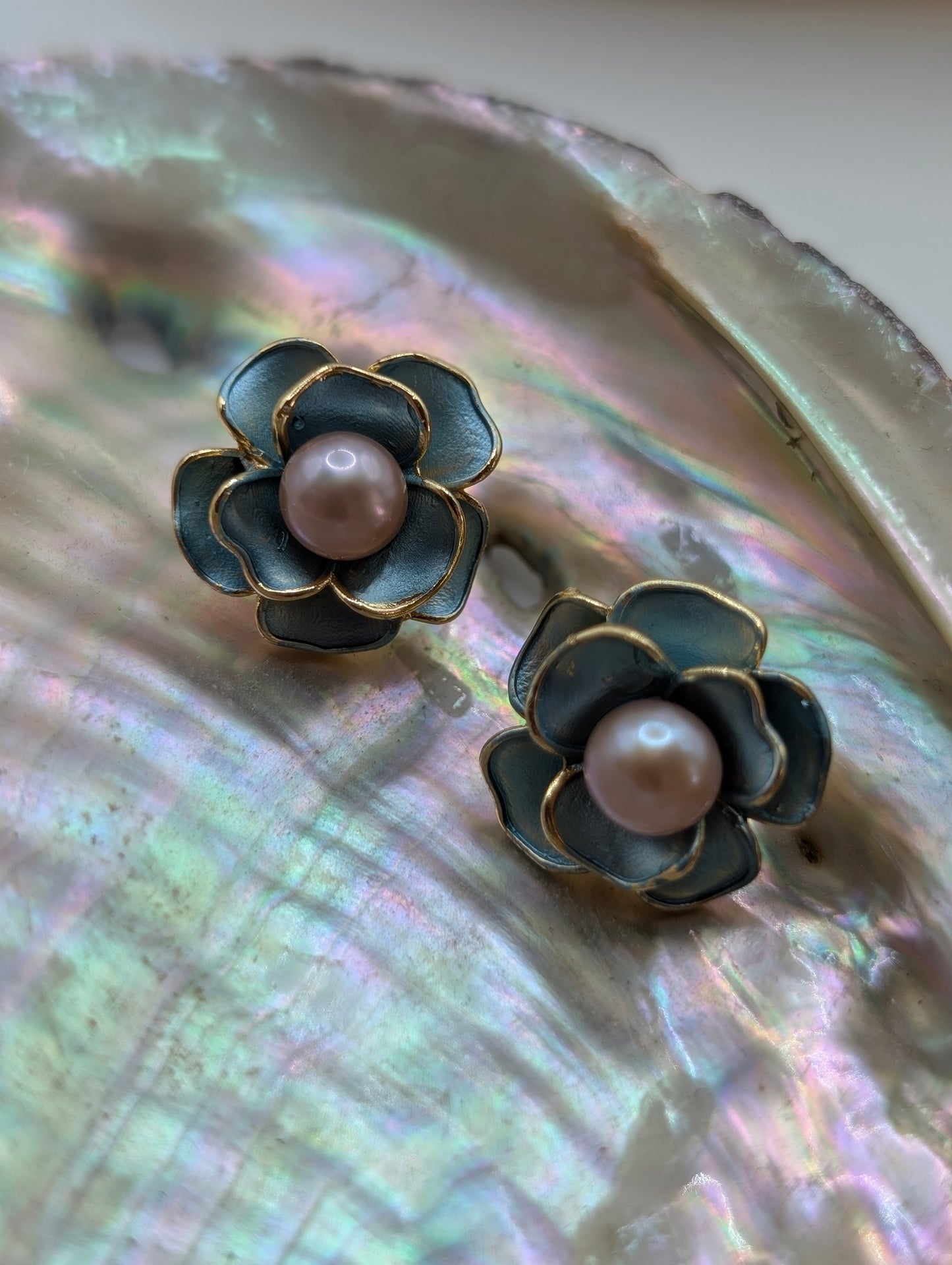 Gold flower earrings with green enamel petals and freshwater pearls