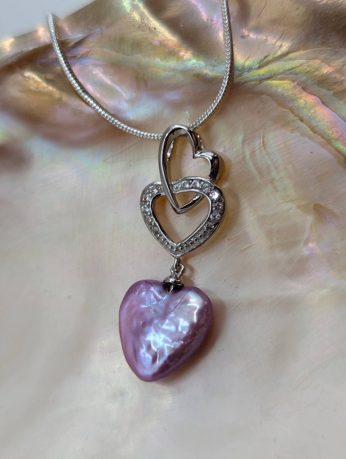 Pink heart pearl on double heart drop