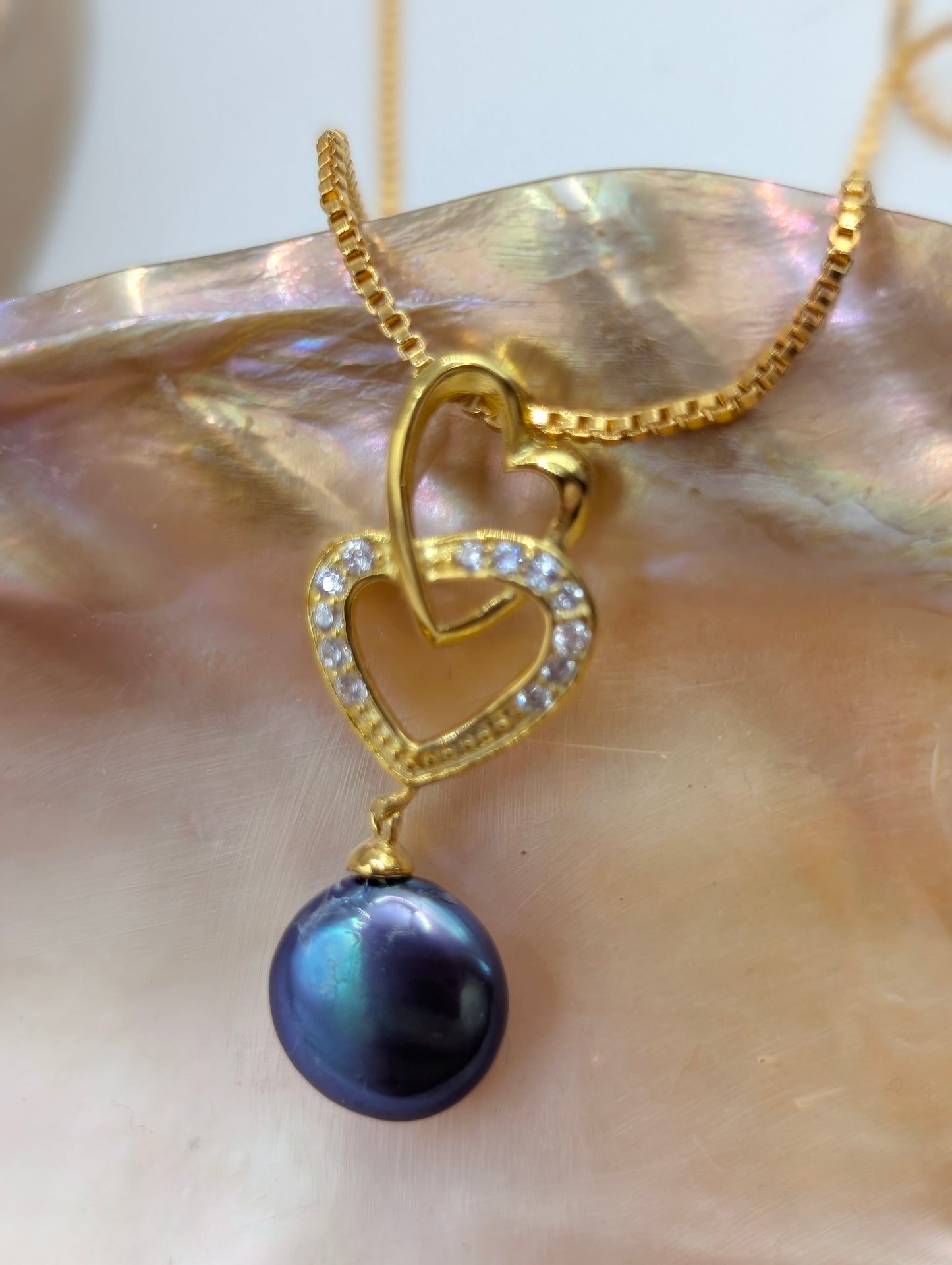 Gold double heart drop with peacock pearl coin