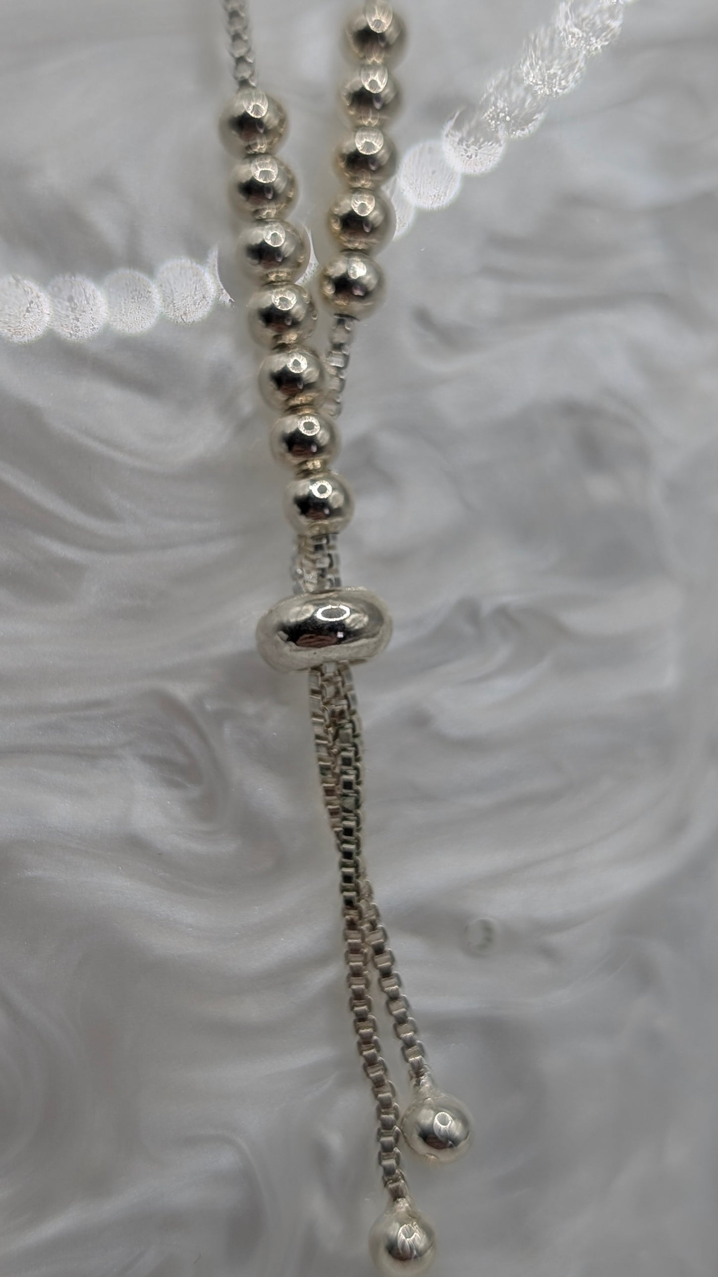 Adjustable sterling silver beaded bracelet